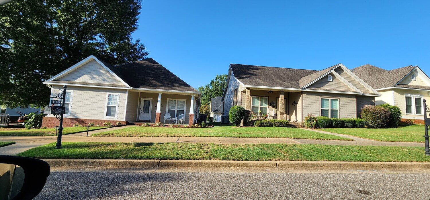 Completed asphalt shingle roof replacement on a home in Prattville, AL